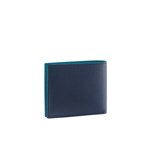 BULGARI BULGARI Man hipster compact wallet in soft, denim sapphire blue full-grain calf leather with tropical turquoise light blue nappa leather interior. Iconic palladium plated-brass embellishment with tropical turquoise light blue enamel, and folded closure. BBM-WLT-HIPST-8C-SFGCL image 3