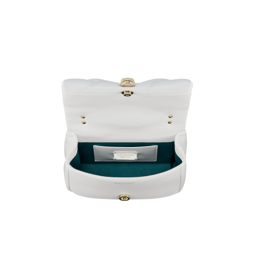 Serpenti Cabochon Maxi Chain mini crossbody bag in soft spring peridot green quilted calf leather with Niagara sapphire blue nappa leather lining. Captivating snakehead closure in dark ruthenium-plated brass embellished with green agate scales and red enamel eyes. 1164-MSMb image 4