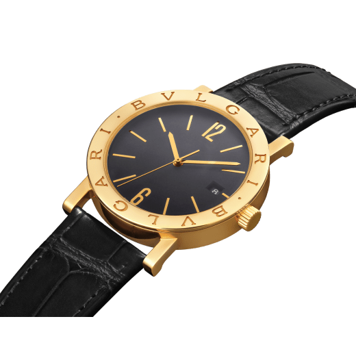 BULGARI BULGARI watch with mechanical automatic in-house movement, 18 kt yellow gold case and bezel engraved with double logo, black opaline dial and black alligator bracelet. Water resistant up to 50 meters 103967 image 2
