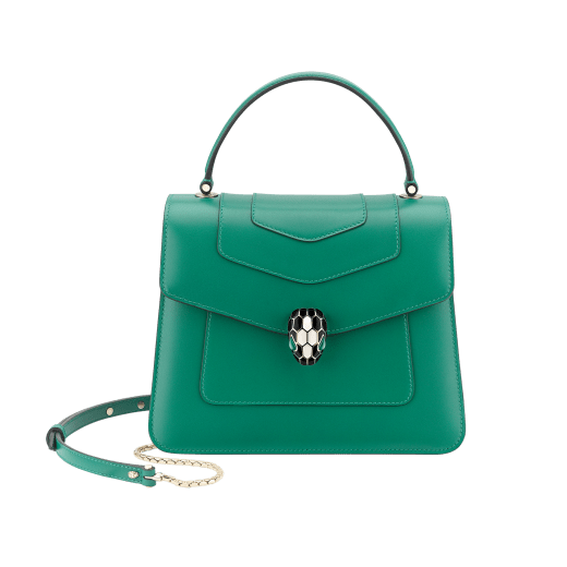 “Serpenti Forever” top handle bag in emerald green calf leather. Iconic snake head closure in light gold plated brass enhanced with black and white agate enamel and green malachite eyes. 1050-CL image 1