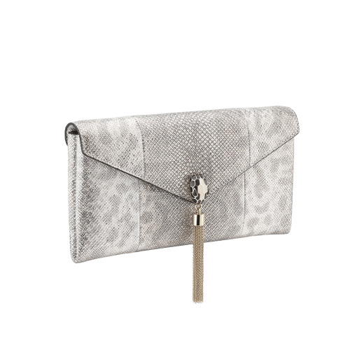 Serpenti evening clutch in milky opal metallic karung skin. Snakehead stud closure with tassel in light gold plated brass and top decorated with black and glitter milky opal enamel, and black onyx eyes. 526-001-0817S-MK image 2