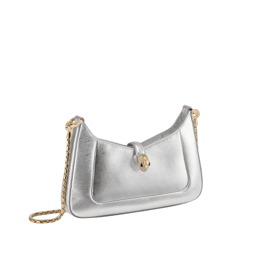 Serpenti Baia small shoulder bag in silver Striated calf leather with foggy opal grey nappa leather lining. Captivating snakehead magnetic closure in light gold-plated brass embellished with brushed grey enamel and light gold-plated brass scales and black onyx eyes; additional zipped top closure. SEA-001-1274S-STRI image 2