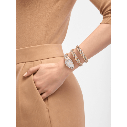Serpenti Tubogas Infiniti double-spiral watch in 18 kt rose, yellow and white gold set with diamonds, and full pavé dial. Water-resistant up to 30 metres 104096 image 1