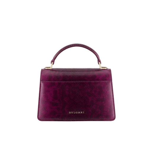Serpenti Forever mini top handle bag in light amethyst pure karung with light amethyst nappa leather lining. Captivating snakehead magnetic closure in gold-plated brass embellished with light amethyst enamel and gold-plated brass scales, and black onyx eyes. SEA-001-1283XS-kar image 2