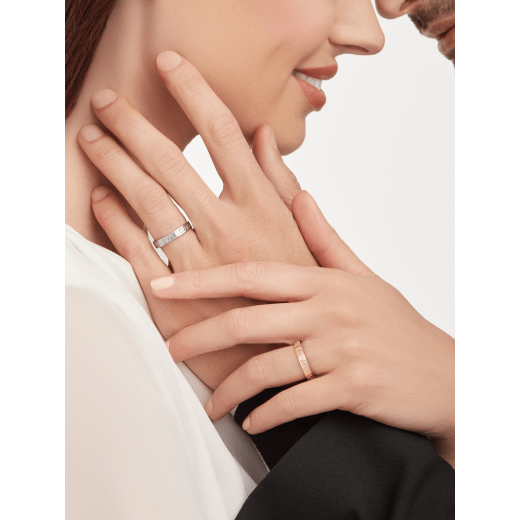 BVLGARI BVLGARI couples' rings in 18 kt rose and white gold, both set with a diamond. A timeless ring set blending modern design with distinctive refinement. BVLGARI-BVLGARI-COUPLES-RINGS-4 image 2