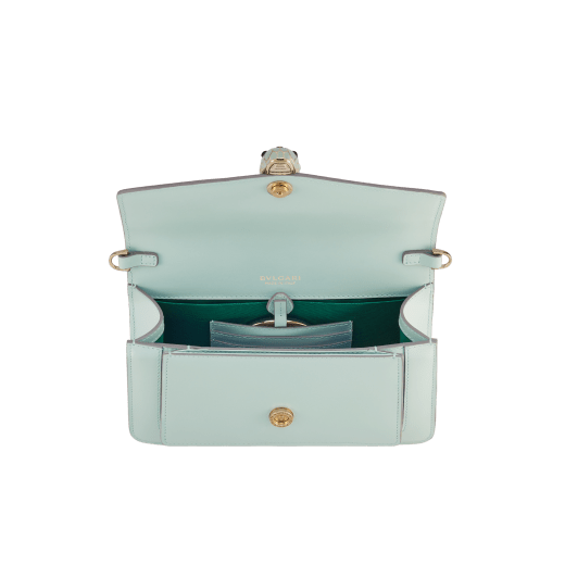 Serpenti Forever East-West small shoulder bag in black calf leather with emerald green gros grain lining. Captivating snakehead magnetic closure in light gold-plated brass embellished with black and white agate enamel scales, and green malachite eyes. 1237-CLa image 4