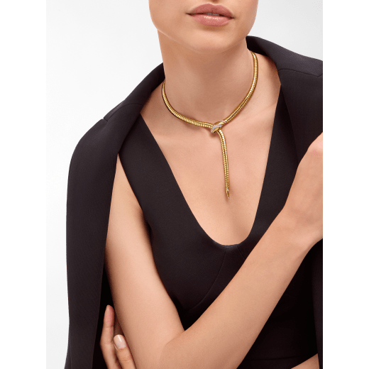 Serpenti 18 kt yellow gold necklace set with demi pavé diamonds on the head and the tail, and black onyx eyes 360632 image 1