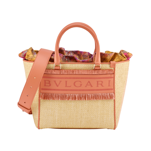 Bulgari Logo medium tote bag in beige raffia with coral carnelian orange calf leather details and customisable tag with hot stamped "Saudi" inscription on one side, coral carnelian orange raffia fringes and beetroot spinel fuchsia nappa leather lining. Iconic Bulgari logo stitched motif, detachable satin satchel with multicoloured print outside and beetroot spinel fuchsia inside, and drawstring closure with captivating snakeheads in light gold-plated brass. Special Resort Edition exclusive to Saudi Arabia. 292510 image 2