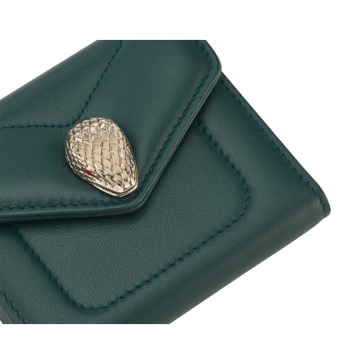 Serpenti Reverse compact wallet in Sahara amber light brown quilted Metropolitan calf leather with taffy quartz pink Metropolitan calf leather interior. Captivating snakehead press button closure in gold-plated brass embellished with red enamel eyes. SRV-COMPACTWLT image 4