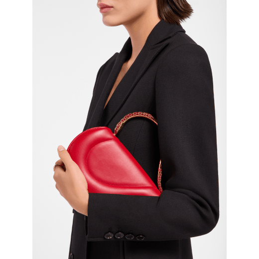 Serpenti Cuore 1968 top handle bag in star rose pink calf leather with crystal rose nappa leather lining. Captivating snake body-shaped top handle in gold-plated brass embellished with star rose pink enamel scales and zirconia eyes; press-button closure. SRN-001-1326S image 1