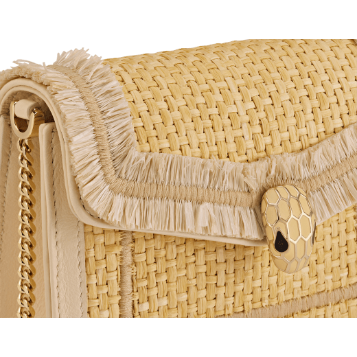 Serpenti Forever micro bag in light gold Molten karung skin with black nappa-leather interior. Captivating snakehead magnetic fastening in light gold-plated brass embellished with red enamel eyes. SEA-MINICROSSBODYb image 4
