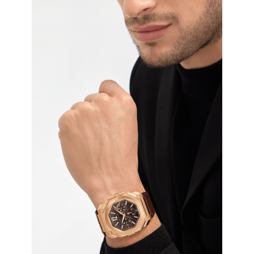 Octo Finissimo Chronograph GMT watch with mechanical manufacture ultra-thin movement (3.30 mm thick), automatic winding, 43 mm satin-polished 18 kt rose gold case, brown lacquered dial with sunray finish and brown alligator bracelet. Water-resistant up to 100 metres 103468 image 1