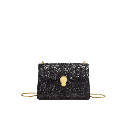 Serpenti Forever mini crossbody bag in natural suede with different-size gold crystals and black nappa leather lining. Captivating magnetic snakehead closure in gold-plated brass embellished with "diamantatura" engraving on the scales and black onyx eyes. 986-CDS image 1