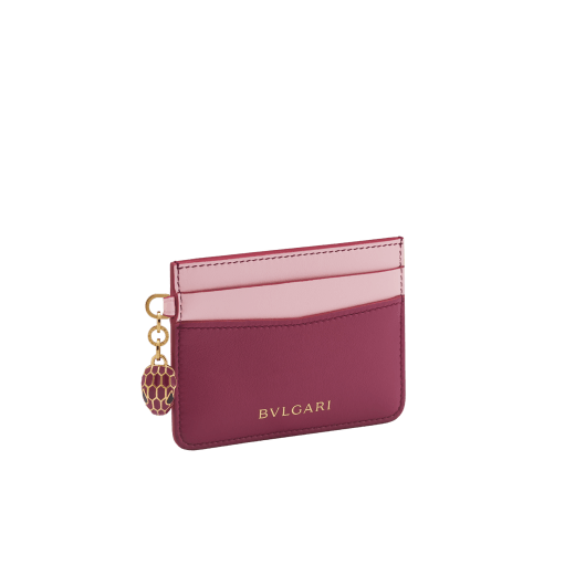 Serpenti Forever card holder in gold Urban full-grain calf leather. Captivating snakehead charm in light gold-plated brass embellished with red enamel eyes. SEA-CC-HOLDER-CLa image 1