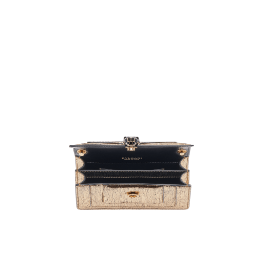 Serpenti Forever mini crossbody bag in light gold Nightbird calf leather with black nappa leather lining. Captivating snakehead magnetic closure in light gold-plated brass embellished with black and white agate enamel scales and black onyx eyes. 986-NCL image 4