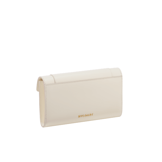 Serpenti Forever large wallet in black calf leather with emerald green nappa leather interior. Captivating snakehead magnetic closure in light gold-plated brass embellished with black enamel and light gold-plated brass scales, and black onyx eyes. SEA-LONG-WLT-R image 3