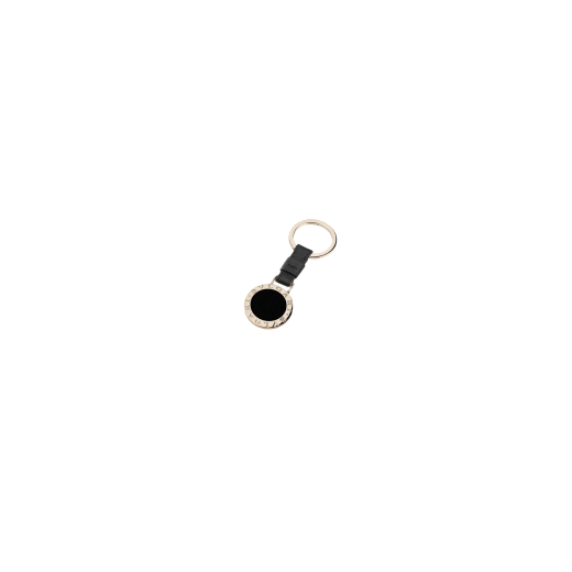 BULGARI BULGARI keyring in black calf leather with light gold-plated brass iconic décor embellished with a black enamel insert and brisé ring. 32764 image 2