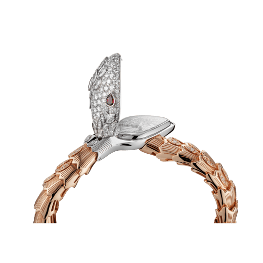 Serpenti Secret Watch with 18 kt white gold head set with brilliant cut and marquise cut diamonds and ruby eyes, 18 kt white gold case, 18 kt white gold dial set with brilliant cut diamonds, single spiral bracelet in 18 kt rose and white gold, set with brilliant cut diamonds. 102239 image 3