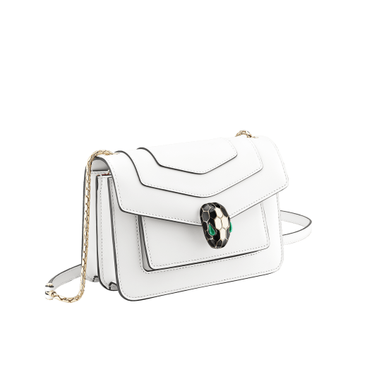 Serpenti Forever small crossbody bag in white agate calf leather with heather amethyst fuchsia grosgrain lining. Captivating snakehead closure in light gold-plated brass embellished with black and white agate enamel scales and green malachite eyes. 1082-CLb image 2
