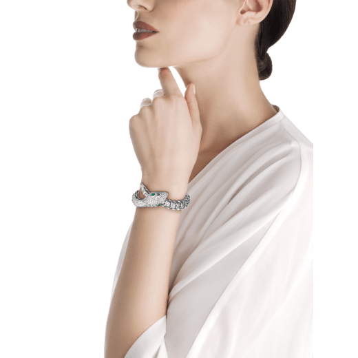 Serpenti Secret Watch with 18 kt white gold case, 18 kt white gold head, dial and single spiral bracelet all set with brilliant cut and marquise cut diamonds, and emerald eyes . 102238 image 3