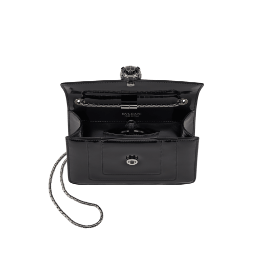 Serpenti Forever small crossbody bag in silver Striated calf leather with foggy opal grey nappa leather lining. Captivating snakehead magnetic closure in light gold-plated brass embellished with brushed grey enamel and light gold-plated brass scales and black onyx eyes. 422-CLc image 4