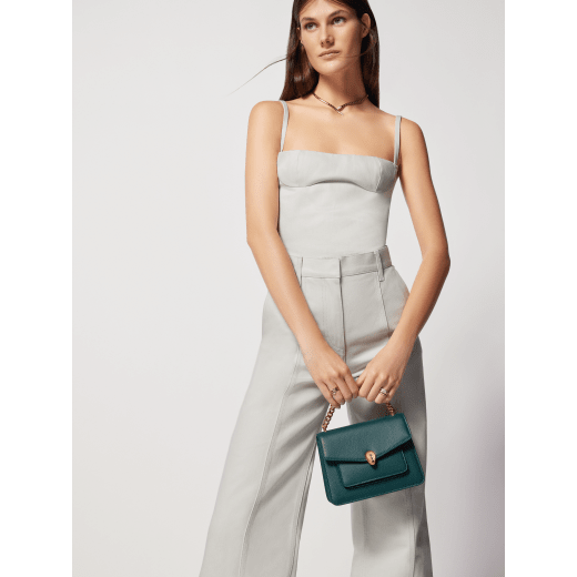Serpenti Forever Maxi Chain small crossbody bag in flash diamond white grained calf leather with foggy opal gray nappa leather lining. Captivating snakehead magnetic closure in gold-plated brass embellished with white mother-of-pearl scales and red enamel eyes. 1134-MCGC image 7