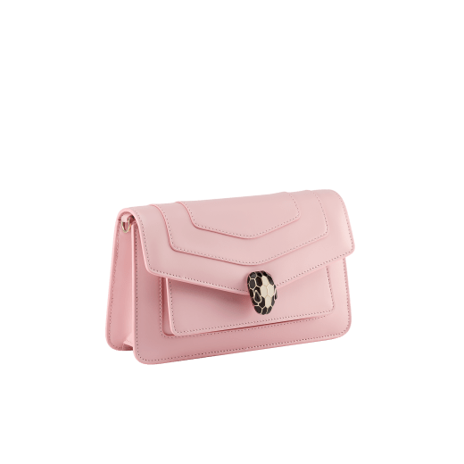 Serpenti Forever East-West small shoulder bag in primrose quartz pink calf leather, with heather amethyst pink grosgrain lining. Captivating magnetic snakehead closure in light gold-plated brass embellished with black and white agate enamel scales and black onyx eyes. 1237-Cla image 2