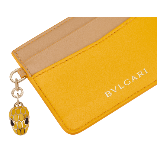 Credit card holder in ruby red and desert quartz calf leather. Serpenti charm in black and white enamel with green malachite enamel eyes and Bulgari logo in metal characters. SEA-CC-HOLDER-CLa image 4