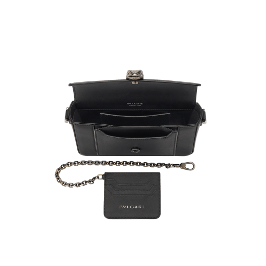 Serpenti Forever small unisex crossbody bag in matt black calf leather with black nappa leather lining and decorative chain. Captivating snakehead closure in dark ruthenium-plated brass embellished with red enamel eyes. 293022 image 6