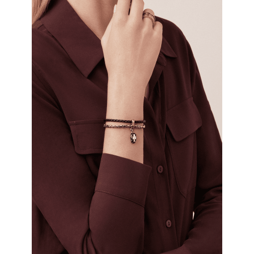 Serpenti Forever bracelet in black braided calf leather and light gold-plated brass chain with magnetic clasp closure. Captivating snakehead charm with black and white agate enamel scales and black enamel eyes. SerpBraidChain-WCL-B image 1