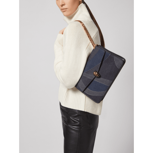Serpenti Forever large shoulder bag in blue Patch Denim with emerald green nappa leather lining. Captivating snakehead magnetic closure in gold-plated brass embellished with black enamel and gold-plated brass scales, and black onyx eyes. 293464 image 1