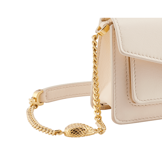 Serpenti Forever micro bag in amaranth garnet red calf leather. Captivating snakehead closure in light gold-plated brass embellished with red enamel eyes. SEA-MICROXBODY image 4