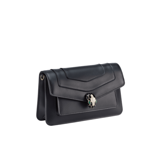 Serpenti Forever East-West small shoulder bag in black calf leather with emerald green gros grain lining. Captivating snakehead magnetic closure in light gold-plated brass embellished with black and white agate enamel scales, and green malachite eyes. 1237-CLa image 2