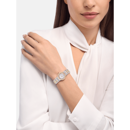 Bvlgari Bvlgari watch in 18 kt yellow gold and polished and satin-brushed stainless steel, double logo engraving on the bezel, white mother-of-pearl mosaic dial and 12 diamond indexes. Water-resistant up to 30 metres 104277 image 1