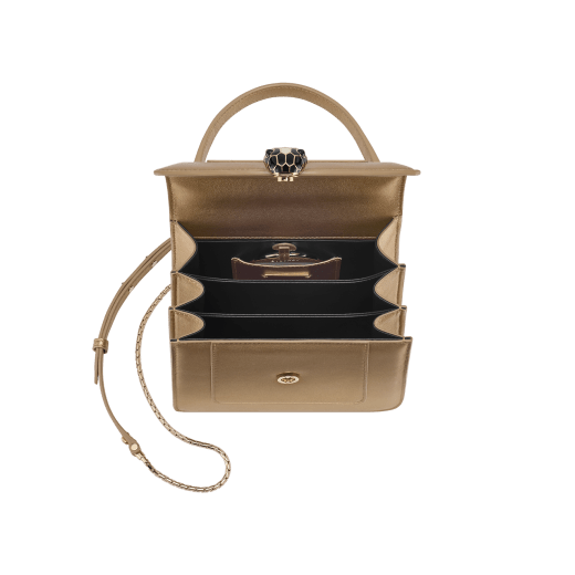 Serpenti Forever small top handle bag in white agate calf leather with heather amethyst fuchsia grosgrain lining. Captivating snakehead closure in light gold-plated brass embellished with black and white agate enamel scales and green malachite eyes. 1122-CLa image 8