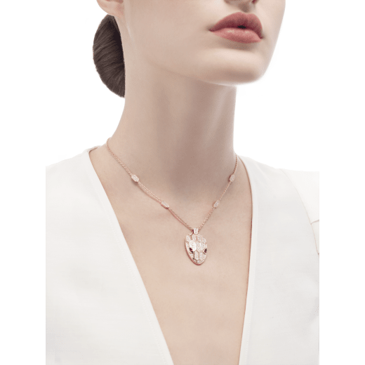 Serpenti necklace in 18 kt rose gold, set with rubellite eyes and with pavé diamonds on the chain and the head. 352725 image 4