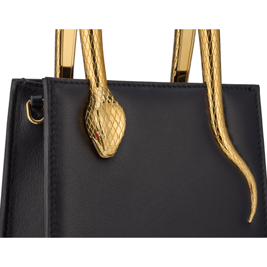 Serpentine mini tote bag in ivory opal Metropolitan calf leather with black nappa leather lining. Captivating snake body-shaped handles in gold-plated brass embellished with engraved scales and red enamel eyes. SEA-1223 image 5