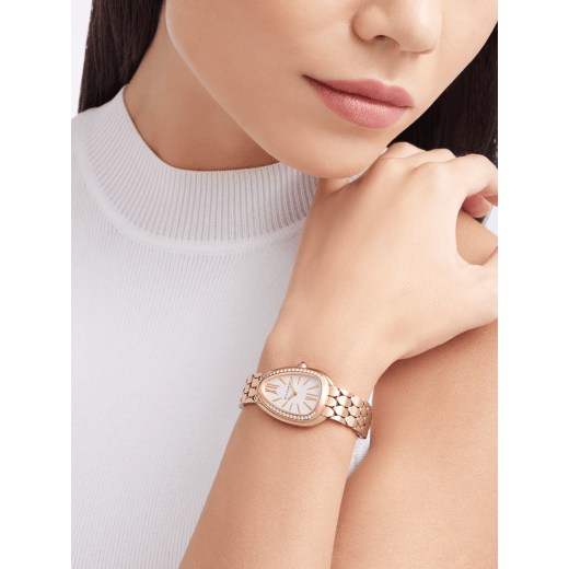 Serpenti Seduttori watch with 18 kt rose gold case, 18 kt rose gold bracelet, 18 kt rose gold bezel set with diamonds and a white silver opaline dial. 103941 image 2