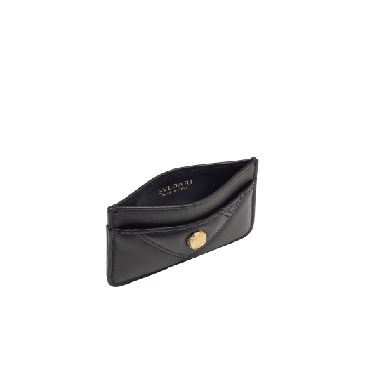 Serpenti Cabochon card holder in black calf leather with maxi matelassé pattern. Captivating snakehead rivet in gold-plated brass embellished with red enamel eyes. SCB-CCHOLDER image 2