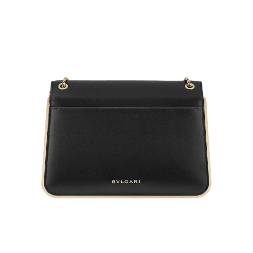 Serpenti Forever medium shoulder bag in black Metropolitan calf leather with light gold-plated brass frames and black nappa leather lining. Captivating snakehead magnetic closure in light gold-plated brass embellished with black enamel scales, and black onyx eyes. 1077-MF image 3