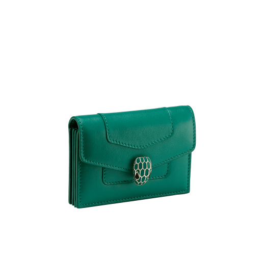 "Serpenti Forever" gusseted card holder in black calf leather. Tempting light gold-plated brass snakehead stud closure, finished with matte black enamel, and black enamel eyes. SEA-CCACCORDEON image 1