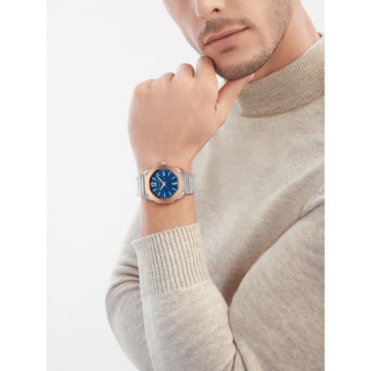 Octo Roma automatic watch with interchangeable blue rubber strap, satin-polished stainless steel case and bracelet, 18 kt rose gold bezel and blue Clous de Paris dial. Mechanical automatic in-house movement. Water-resistant up to 100 metres. 103926 image 1