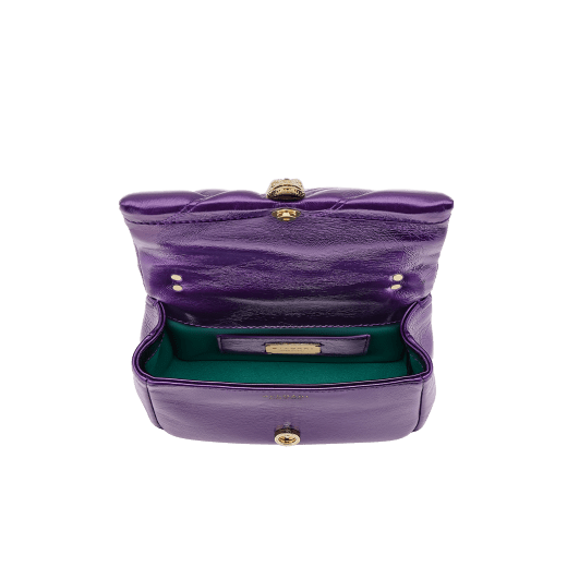 Serpenti Cabochon Maxi Chain mini crossbody bag in vivid amethyst purple calf leather with graphic maxi quilted motif and emerald green nappa leather lining. Captivating magnetic snakehead closure in light gold-plated brass embellished with dark grey hematite scales and red enamel eyes. 292886 image 4