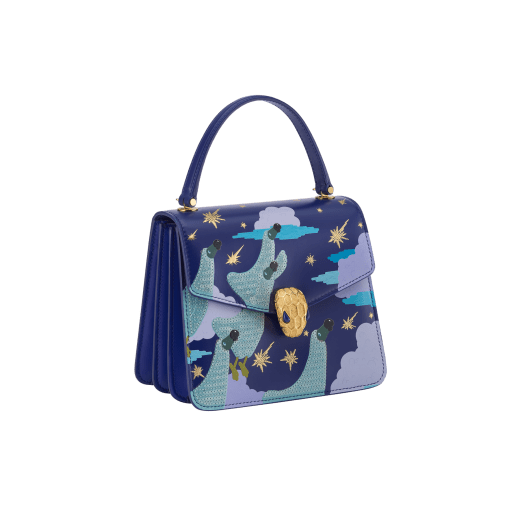 Sunwoo Kim x Bvlgari Serpenti Forever Night small top handle bag in midnight blue calf leather with nocturnal landscape print envisioned by the artist; cobalt blue calf leather sides and lavender lilac nappa leather lining. Captivating snakehead magnetic closure in gold-plated brass embellished with diamond-cut engraving on the scales, and blue lapis lazuli eyes. Limited Edition. 752-SunwooKim image 2