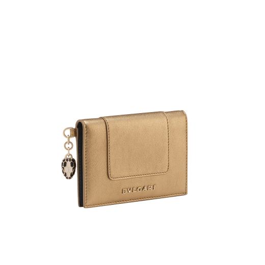 Serpenti Forever folded card holder in coral carnelian orange calf leather with flamingo quartz pink nappa leather interior. Captivating light gold-plated brass snakehead charm with red enamel eyes, and press-stud closure. SEA-CC-HOLDER-FOLD-CLb image 1