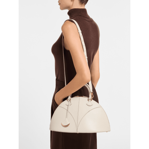 Marquise large top handle bag in black goat leather with black nappa leather lining and zipped closure. Detachable signature black goat leather charm with mirror. DAS-001-1324L image 1