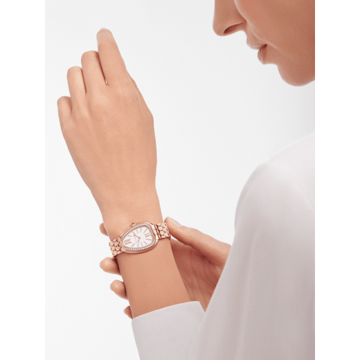Serpenti Seduttori watch with 18 kt rose gold case, 18 kt rose gold bracelet, 18 kt rose gold bezel set with diamonds and a white silver opaline dial. 103941 image 1