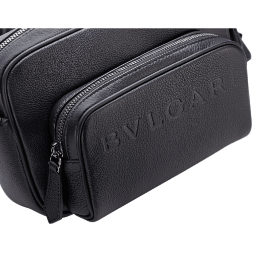 BULGARI Man small camera bag in black smooth and grainy metal-free calf leather with Olympian sapphire blue regenerated nylon (ECONYL®) lining. Dark ruthenium-plated brass hardware, hot stamped BULGARI logo and zipped closure. BMA-1206-CL image 7