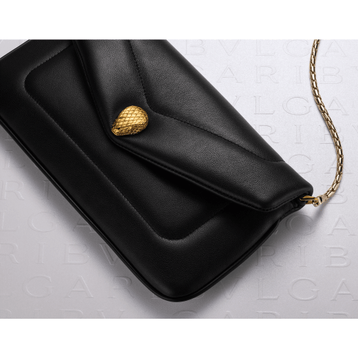 Serpenti Reverse soft envelope chain pouch in Sahara amber light brown quilted Metropolitan calf leather with taffy quartz pink nappa leather interior. Captivating snakehead magnetic closure in gold-plated brass embellished with red enamel eyes. SRV-CHAINCLUTCH image 5
