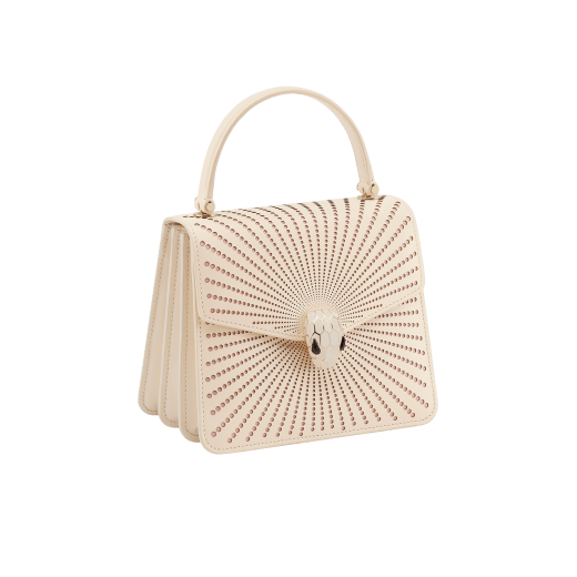 Serpenti Forever top handle bag in ivory opal laser-cut calf leather with caramel topaz beige nappa leather lining. Captivating snakehead closure in light gold-plated brass embellished with matt and shiny ivory opal enamel scales and black onyx eyes. 752-LCL image 2
